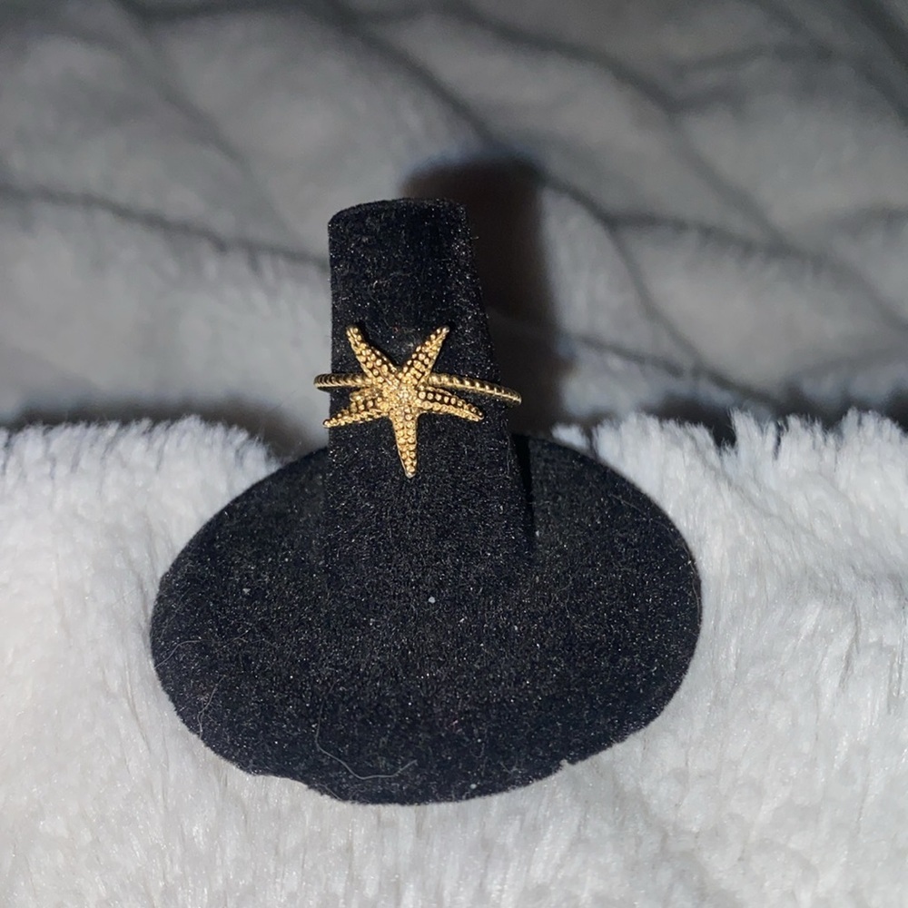 Gold tone starfish ring
